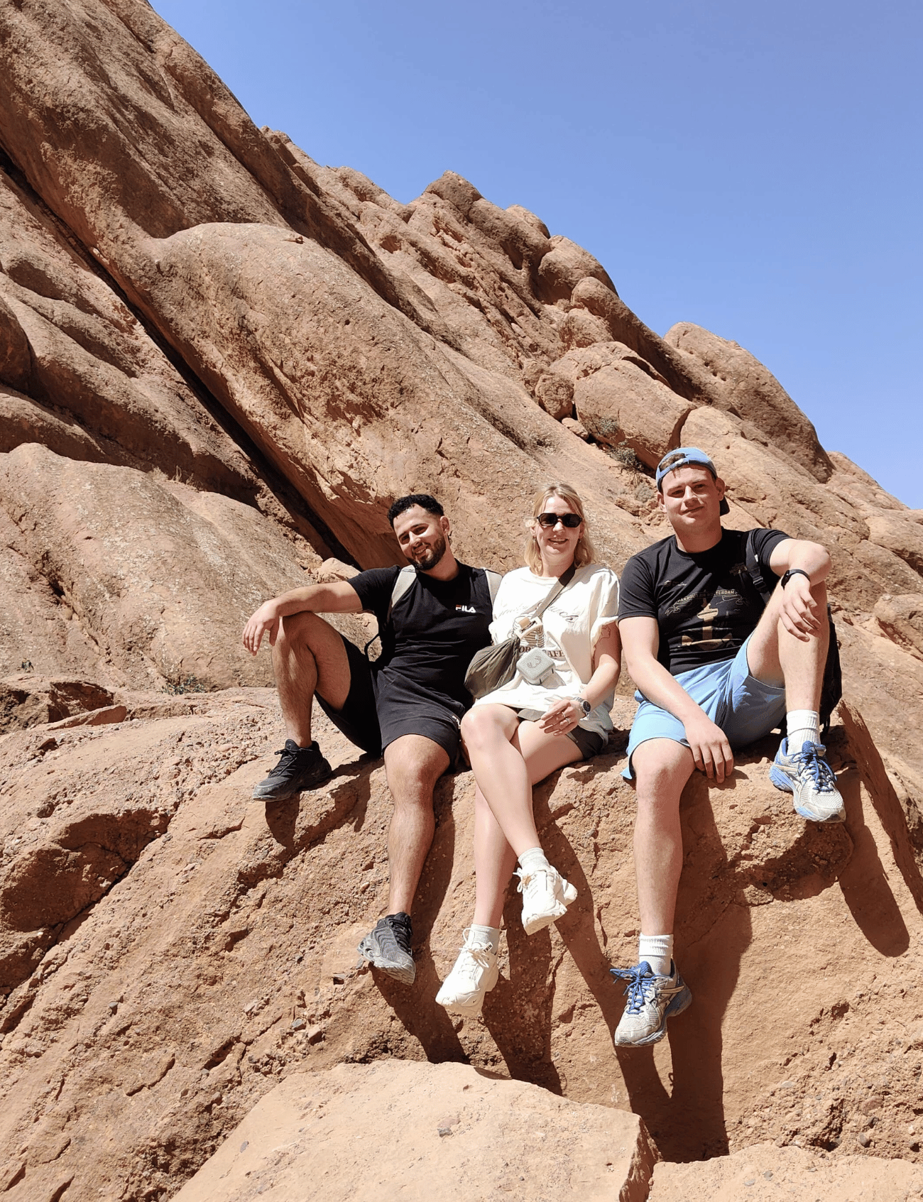 A happy family exploring Morocco during their 8-day trip, experiencing culture and adventure together.